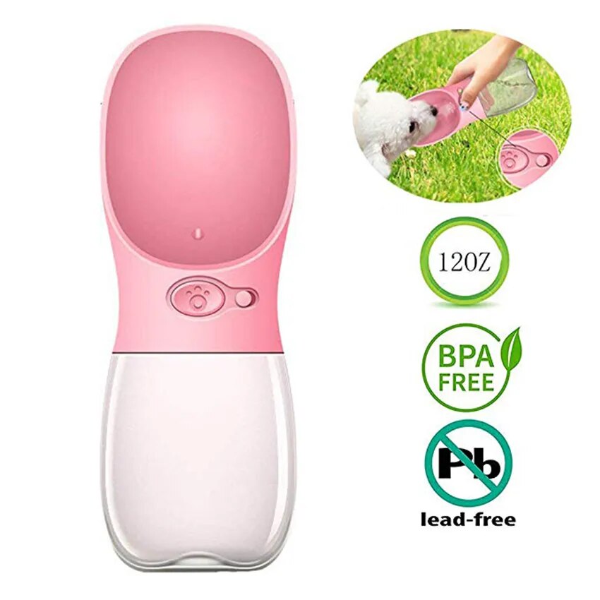 Dog sipping from pink water bottle while walking