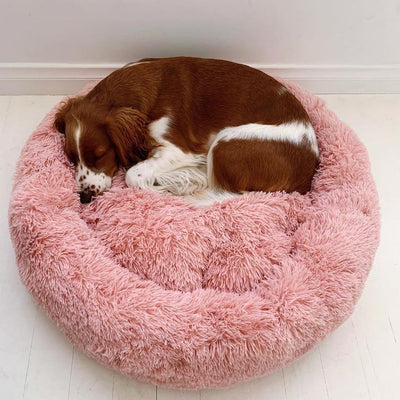 Pink soft and cozy dog bed for improved sleep quality