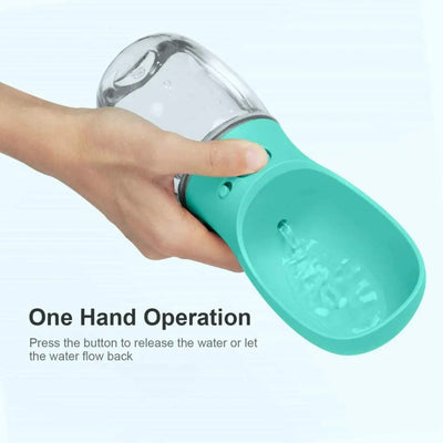 Green portable dog water bottle for outdoor use
