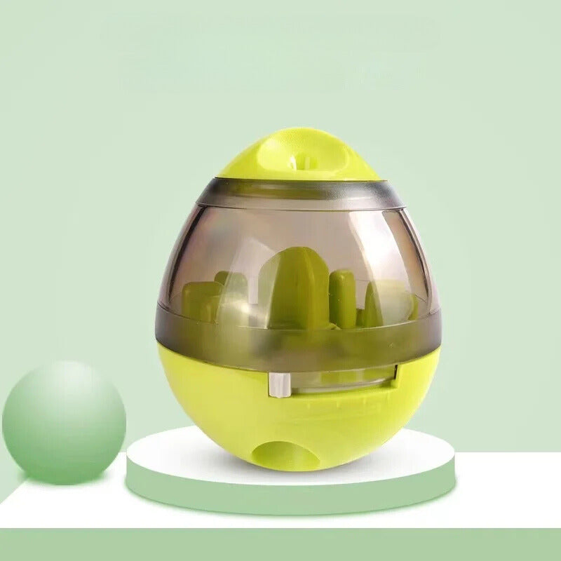 slow feeding dog toy in green with spinning treat compartments
