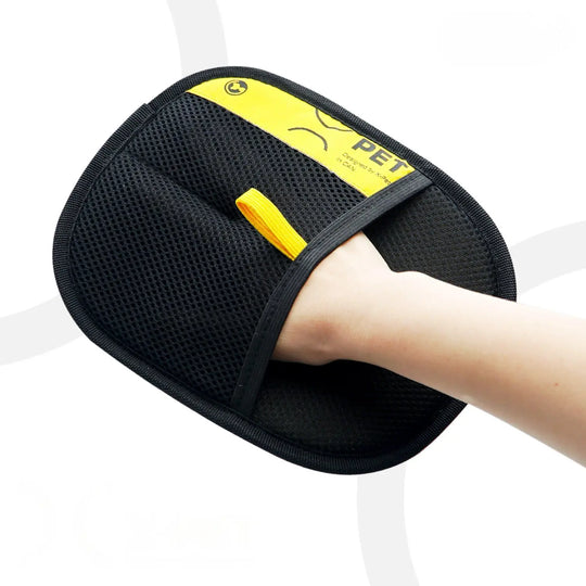Portable grooming glove designed for easy storage and travel-friendly hair removal