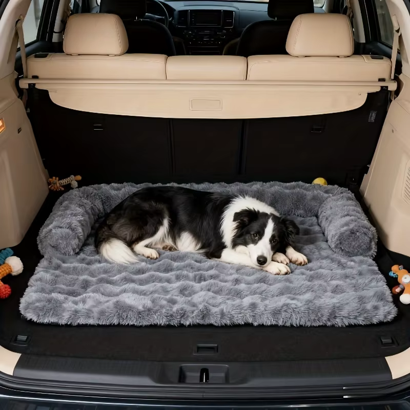 Convertible dog sofa bed designed to fit in car trunks for comfortable travel
