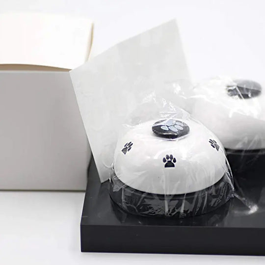 Interactive pet bell for treats and feeding